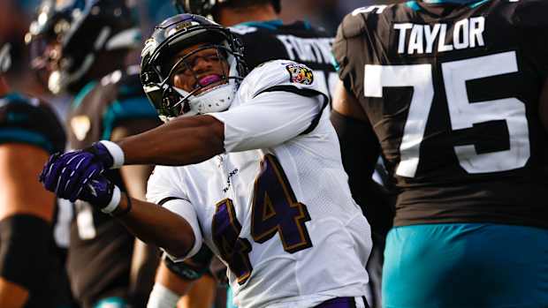 Marlon Humphrey celebrates after a tackle